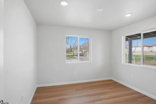 an empty room with windows