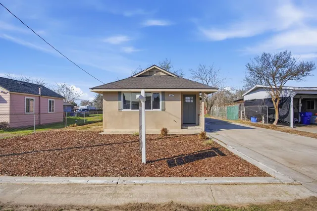 a front view of a house with a porch