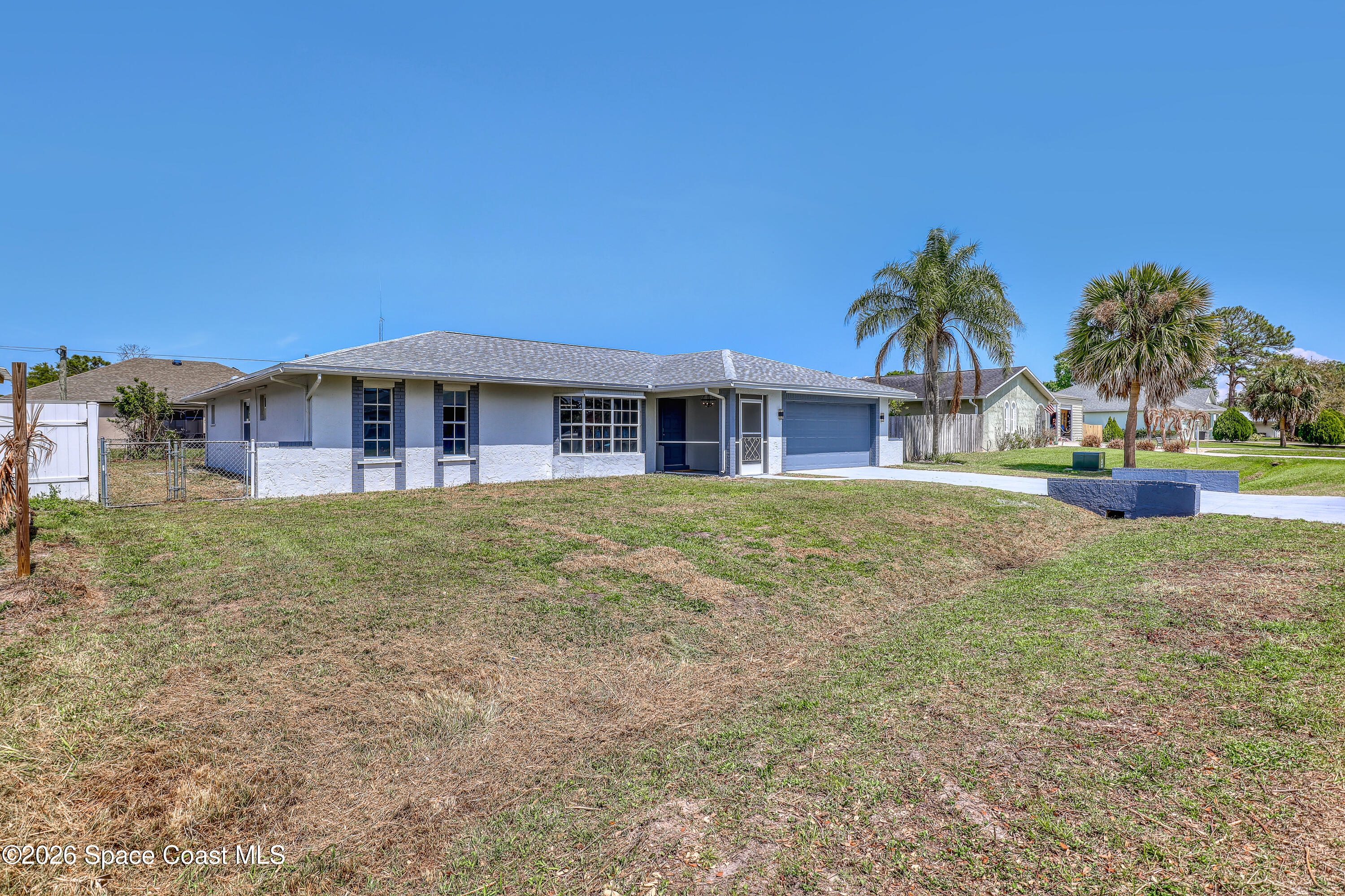 999 Castile Road Southeast Palm Bay, FL 32909 - Photo 3 of 45 Same Front Fenced BackYard