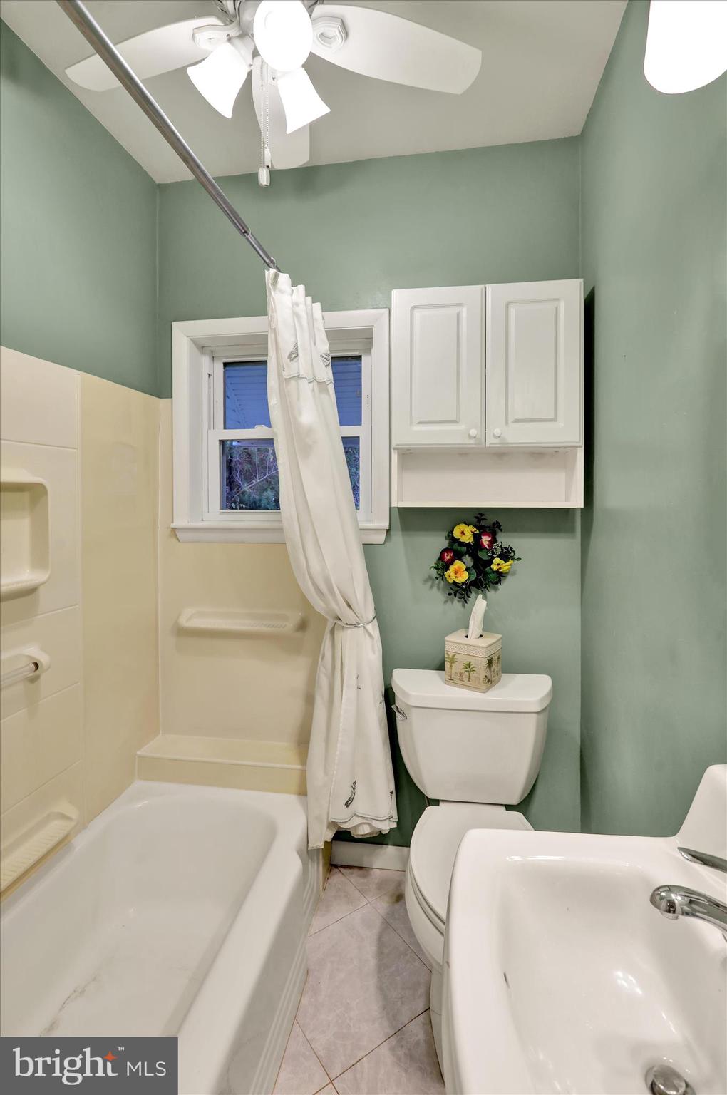 3429 Marion Street Reading, PA 19605 - Photo 18 of 23 a bathroom with a sink a toilet and bathtub