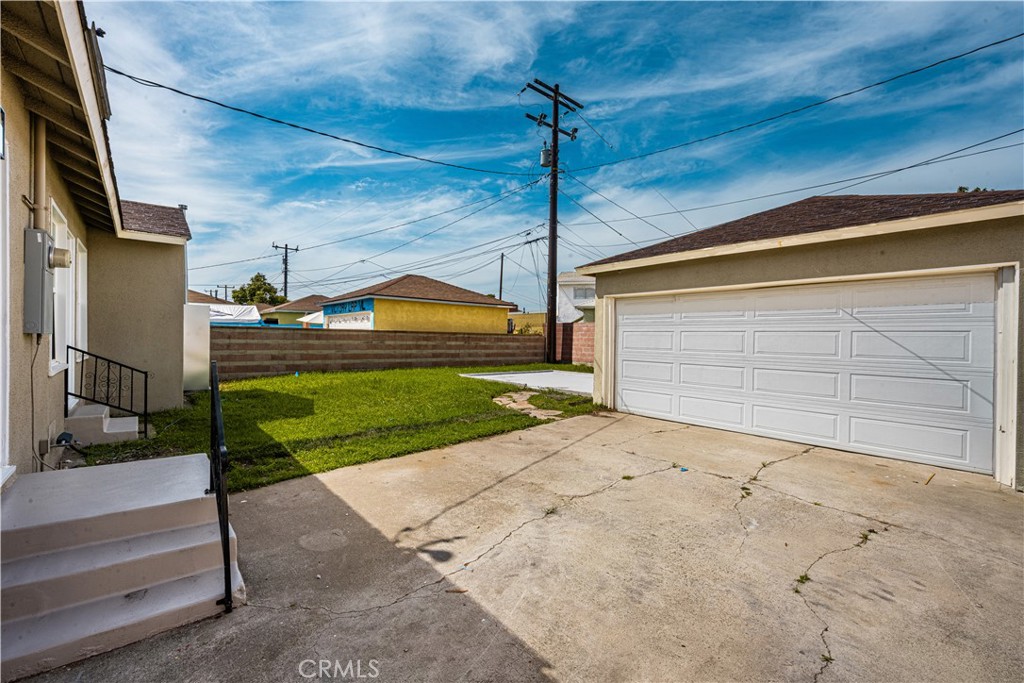 1013 West 138th Street Compton, CA 90222 - Photo 29 of 30 a view of a house with a street