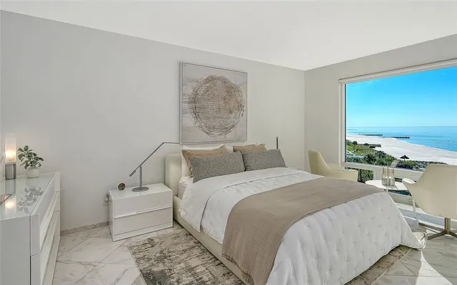 a bed room with a bed and a couch