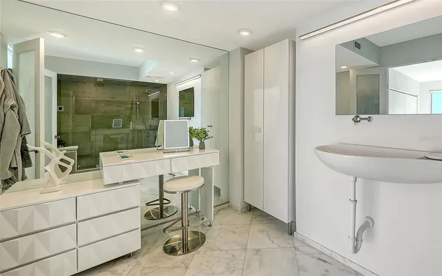 a bathroom with a sink and a mirror