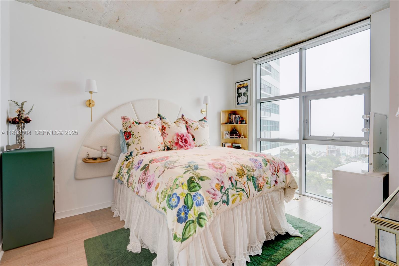 3301 Northeast 1st Avenue, Unit H2304 Miami, FL 33137 - Photo 13 of 27 a bedroom with a bed and a large window