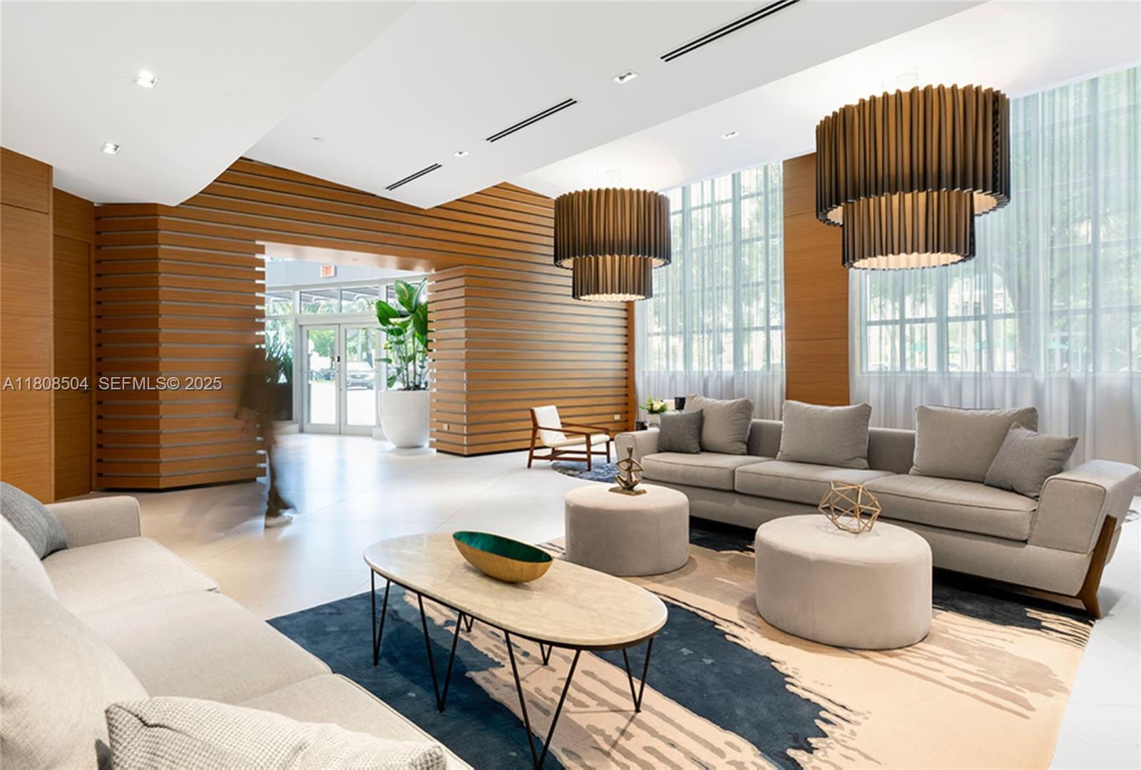 3301 Northeast 1st Avenue, Unit H2304 Miami, FL 33137 - Photo 21 of 27 a living room with furniture and a large window