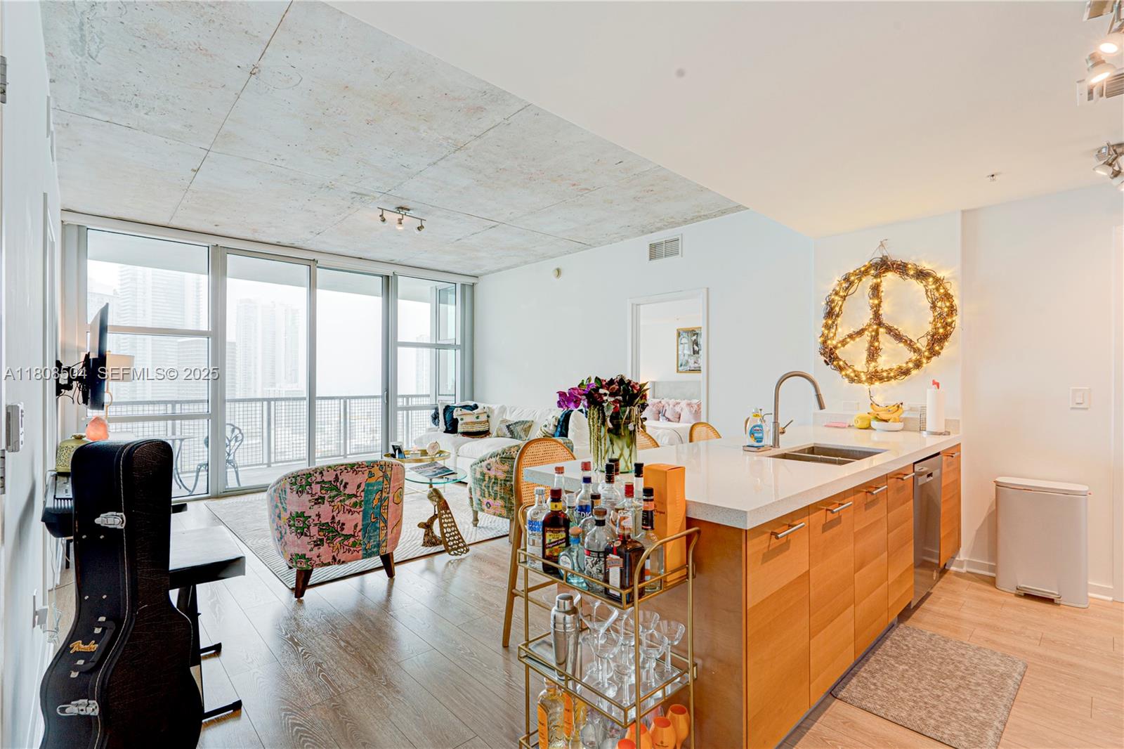 3301 Northeast 1st Avenue, Unit H2304 Miami, FL 33137 - Photo 4 of 27 a very nice looking living room with a large window