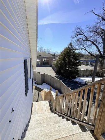 a view of balcony with furniture