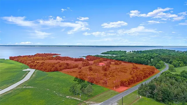 a view of a lake with outdoor space