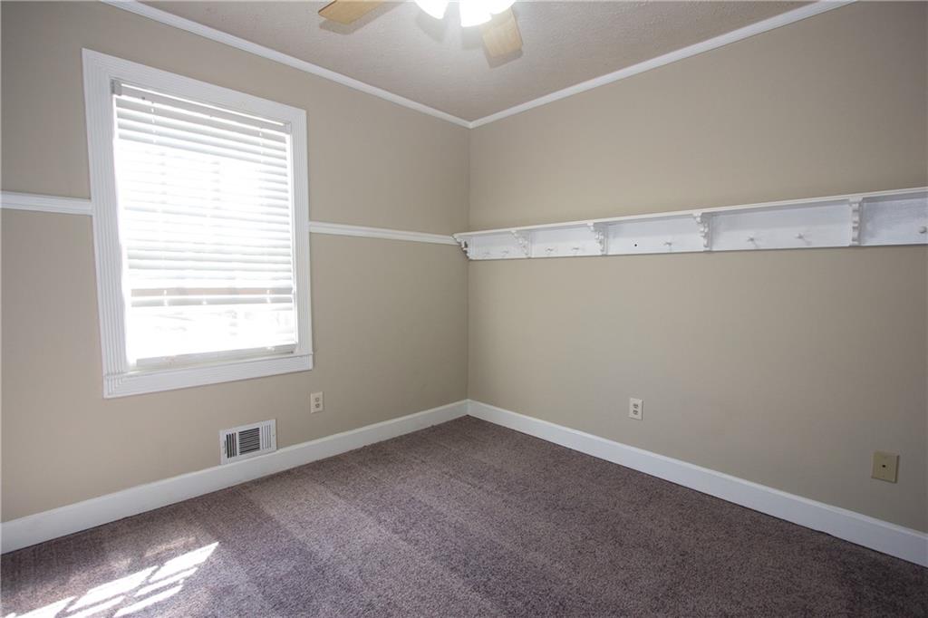 4541 Center Hill Church Road Loganville, GA 30052 - Photo 16 of 25 a room that has a window in it