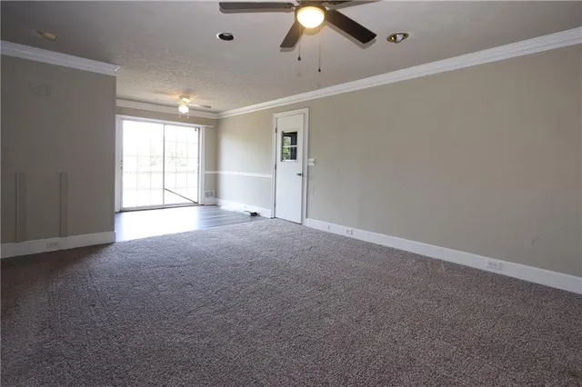 a view of empty room with windows