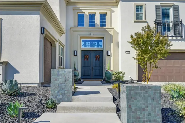 a view of a livingroom with furniture and a table