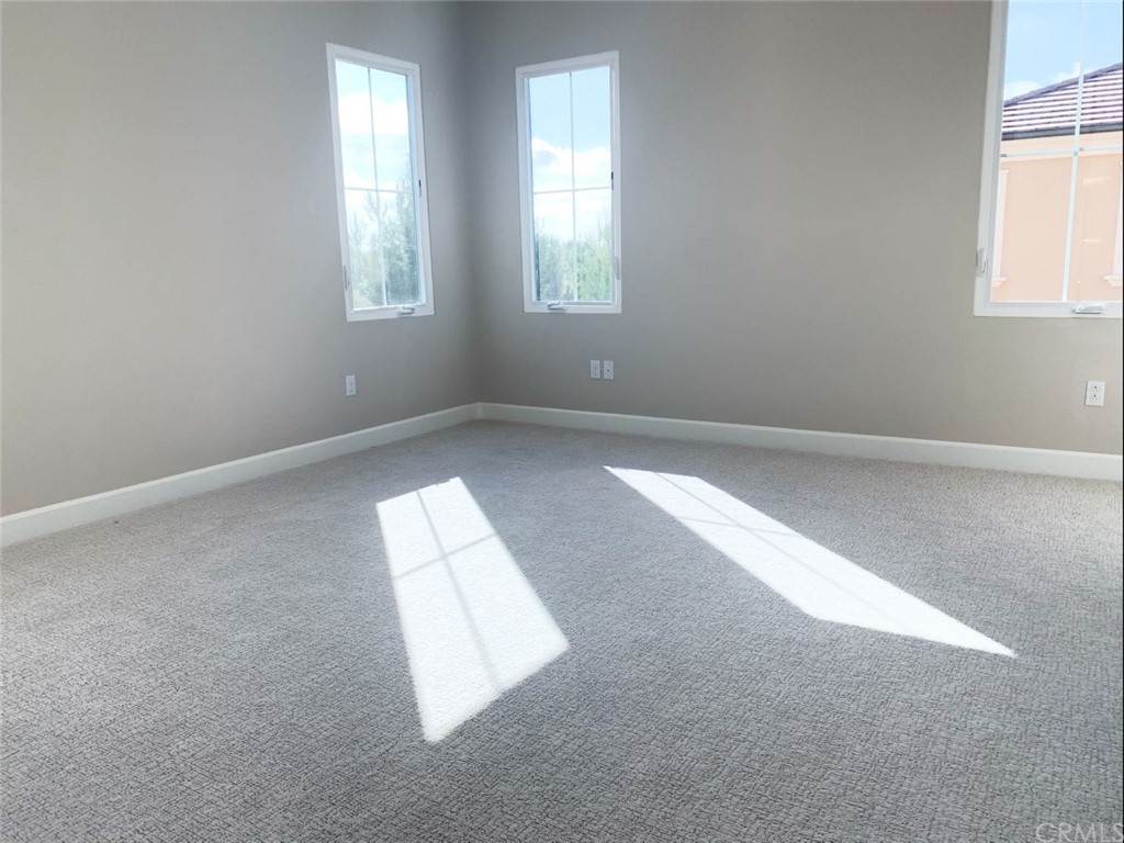 68 Singer Irvine, CA 92620 - Photo 6 of 12 an empty room with a window