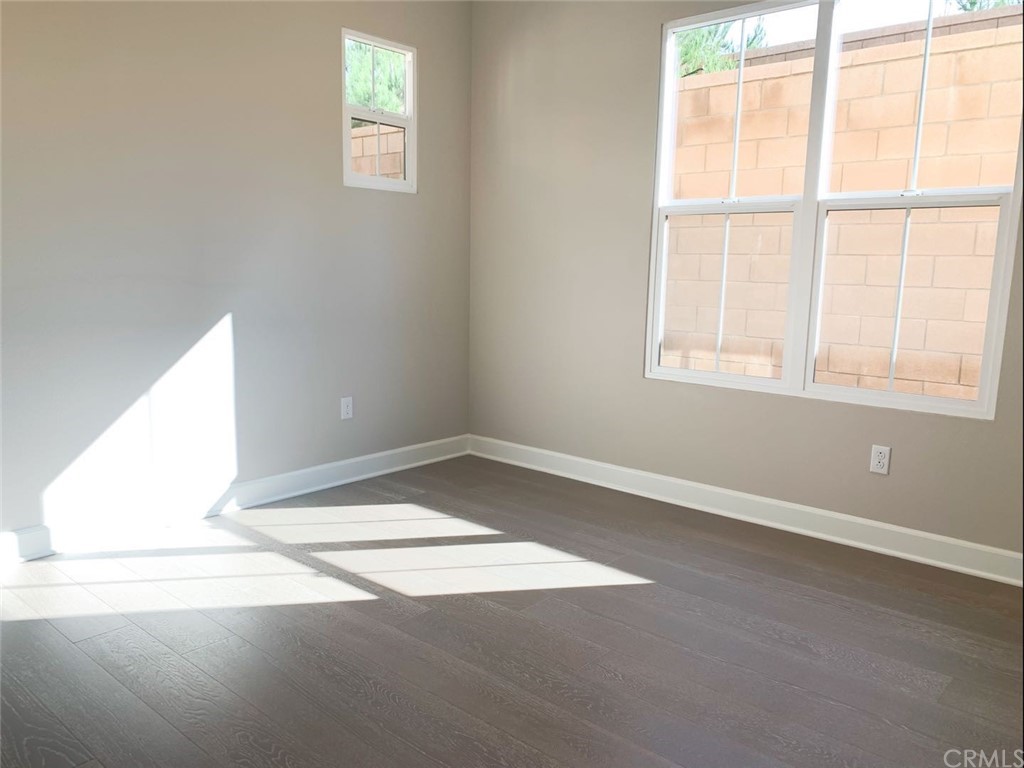 68 Singer Irvine, CA 92620 - Photo 8 of 12 an empty room with a window