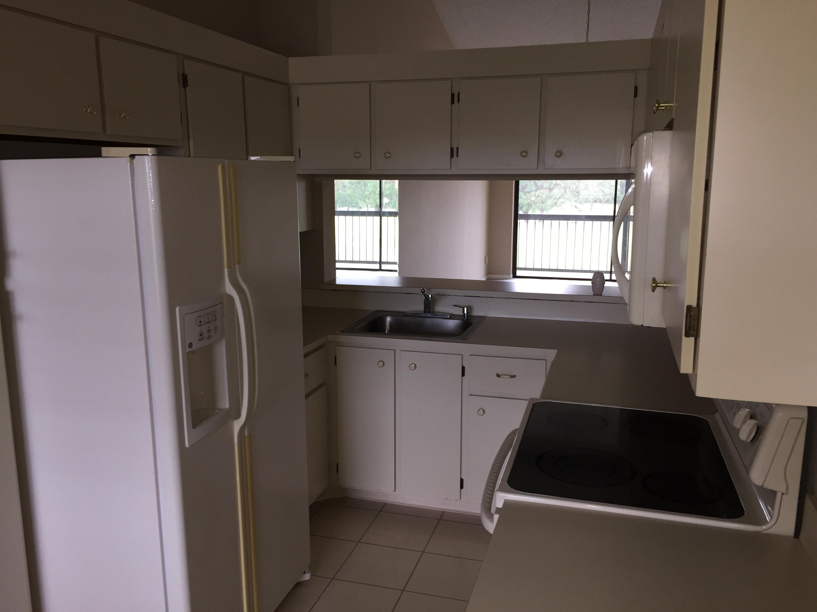 402 Pinecrest Circle, Unit D Jupiter, FL 33458 - Photo 2 of 13 IMG_5336