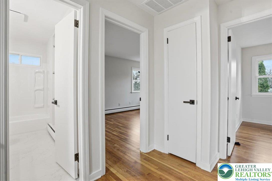 3120 Hilly Road Bethlehem, PA 18017 - Photo 13 of 37 a view of a hallway with wooden floor and closet area