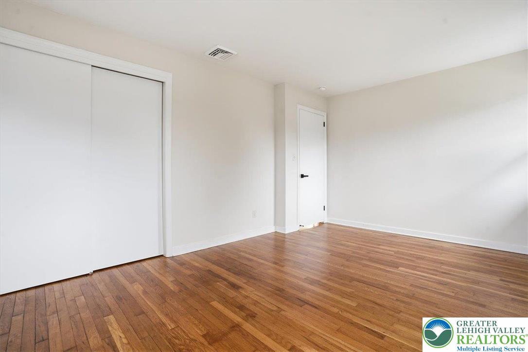 3120 Hilly Road Bethlehem, PA 18017 - Photo 15 of 37 a view of an empty room with wooden floor