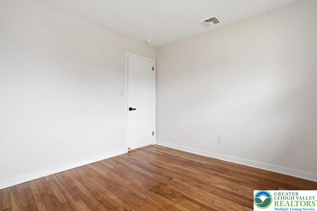 3120 Hilly Road Bethlehem, PA 18017 - Photo 17 of 37 a view of empty room with wooden floor