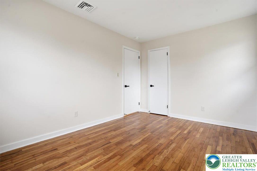 3120 Hilly Road Bethlehem, PA 18017 - Photo 19 of 37 a view of an empty room with wooden floor