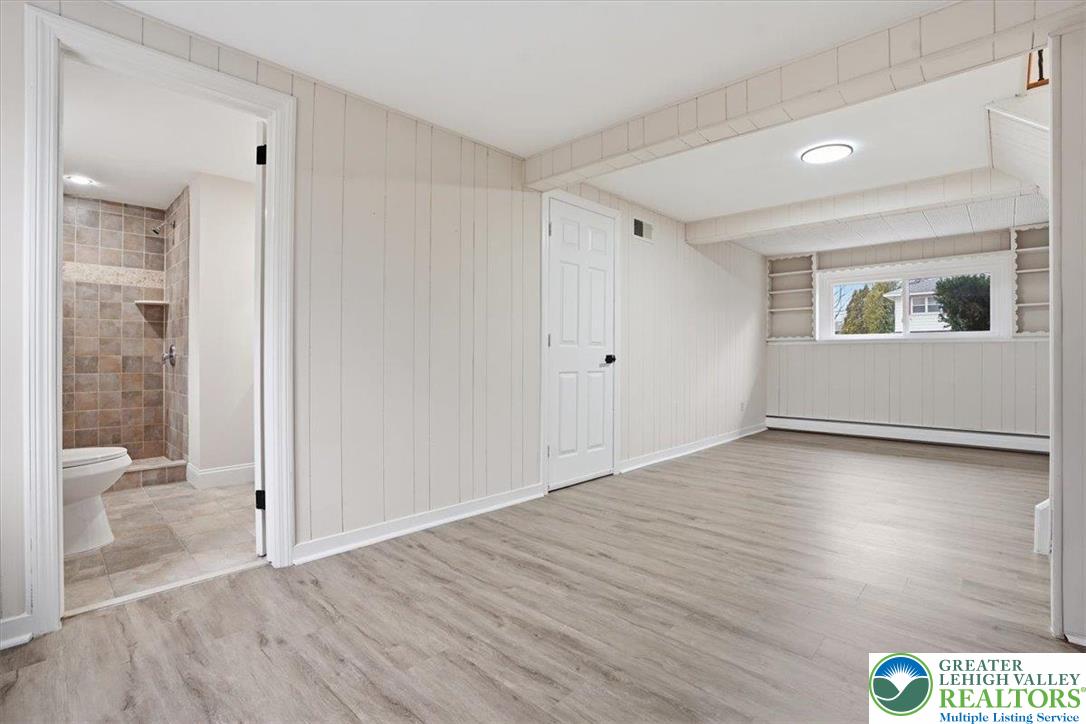 3120 Hilly Road Bethlehem, PA 18017 - Photo 22 of 37 a view of livingroom with hardwood floor and a bathroom