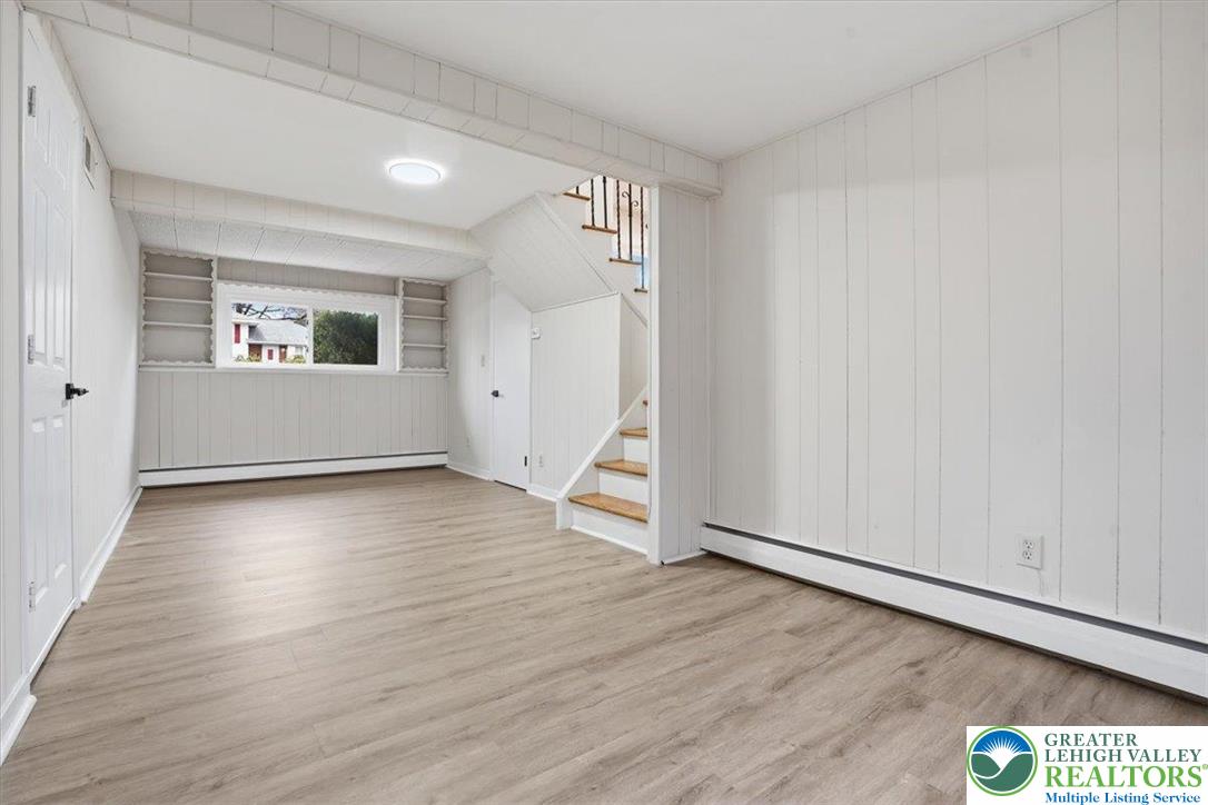 3120 Hilly Road Bethlehem, PA 18017 - Photo 23 of 37 a view of an empty room with wooden floor and a window
