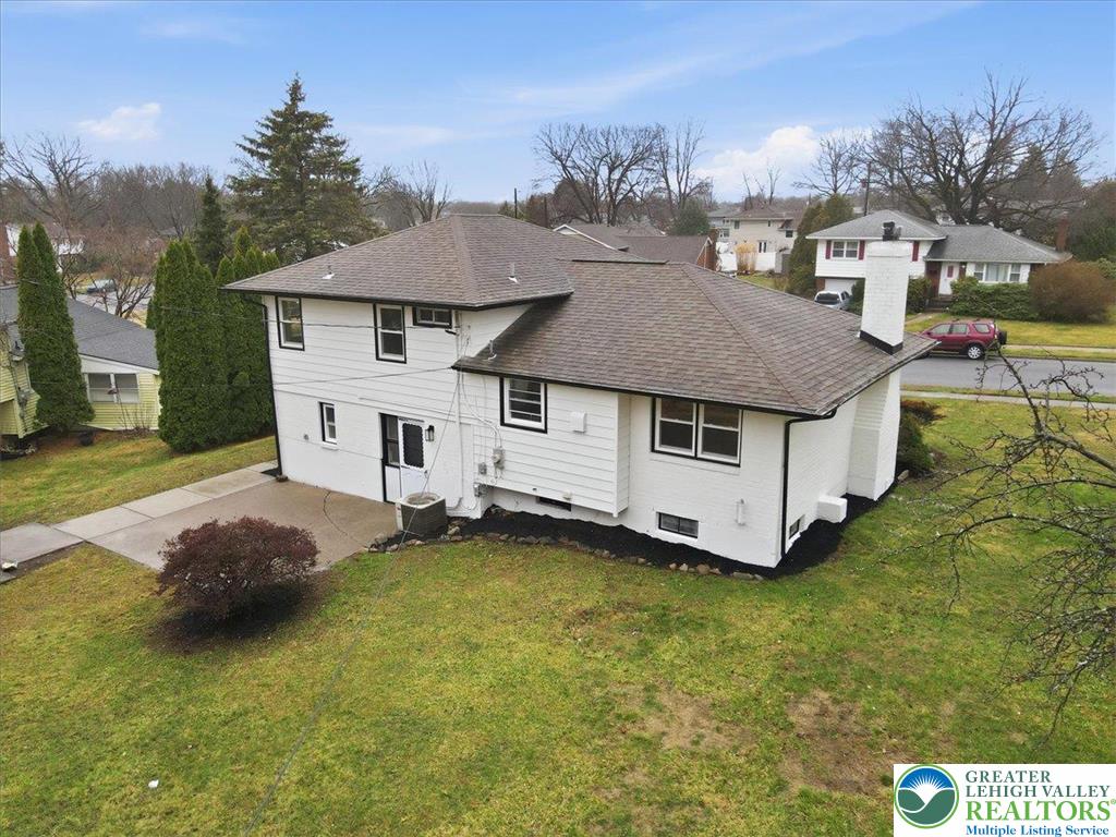 3120 Hilly Road Bethlehem, PA 18017 - Photo 29 of 37 a aerial view of a house with swimming pool and a yard