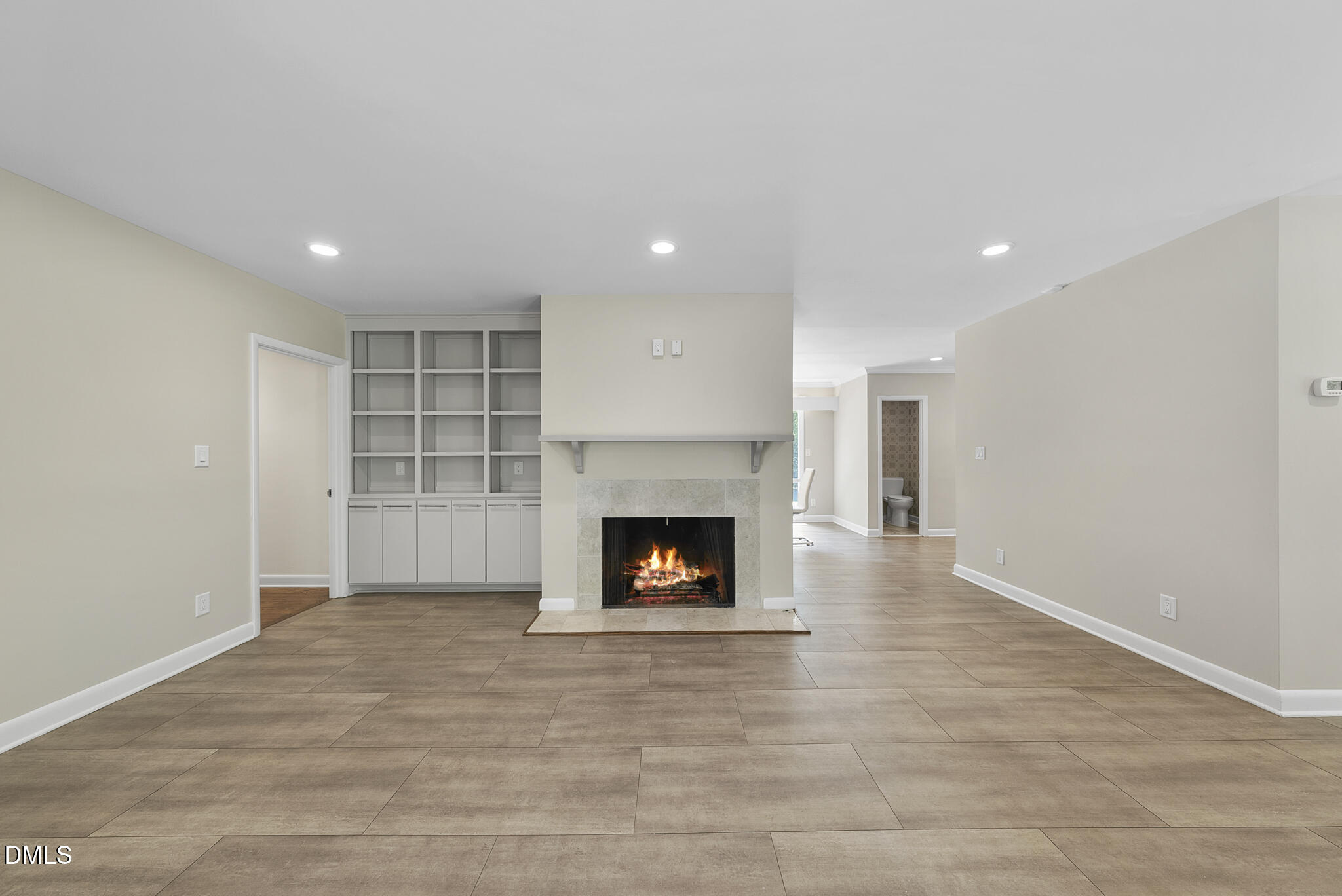 1605 Ridge Road Raleigh, NC 27607 - Photo 22 of 34 a view of an empty room with a fireplace
