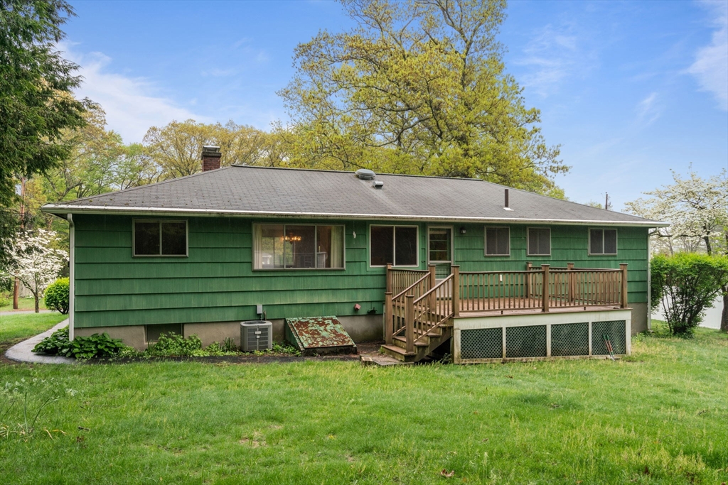 32 Lyman Road Framingham, MA 01701 - Photo 19 of 20 a front view of a house with a garden