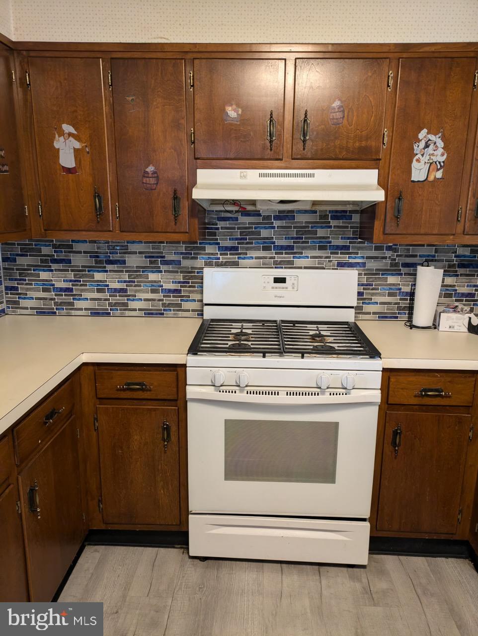 673 South Front Street Steelton, PA 17113 - Photo 11 of 14 a stove top oven sitting inside of a kitchen