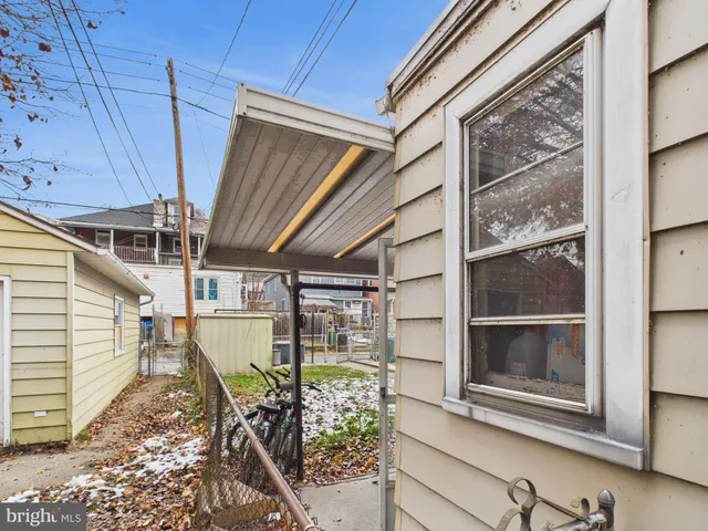 a view of a room with wooden walls