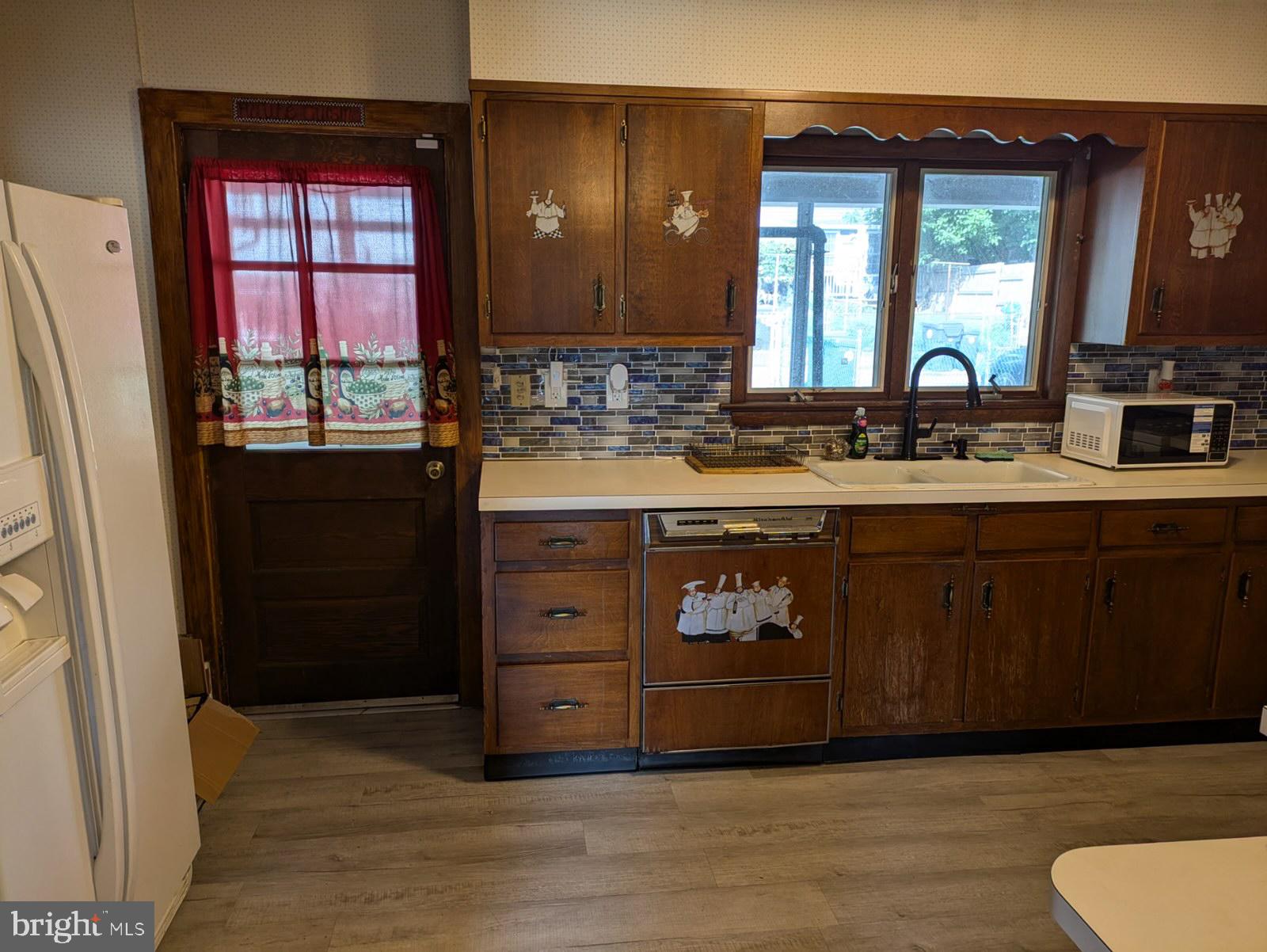673 South Front Street Steelton, PA 17113 - Photo 10 of 14 a bathroom with a double vanity sink and a mirror