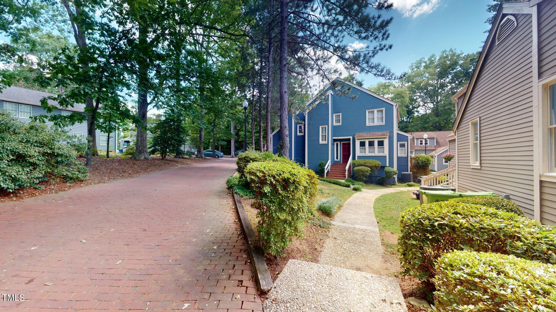 1833 Falls Church Road Raleigh, NC 27609 - Photo 47 of 84 a view of a house with backyard and sitting area