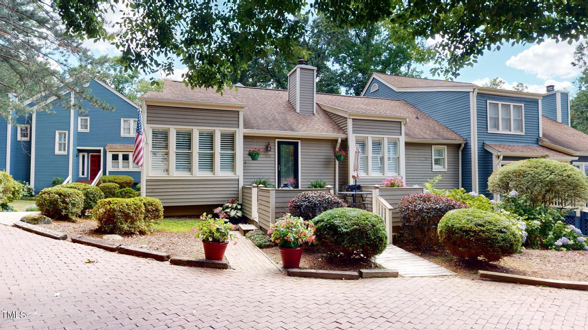 1833 Falls Church Road Raleigh, NC 27609 - Photo 49 of 84 front view of a house with a yard