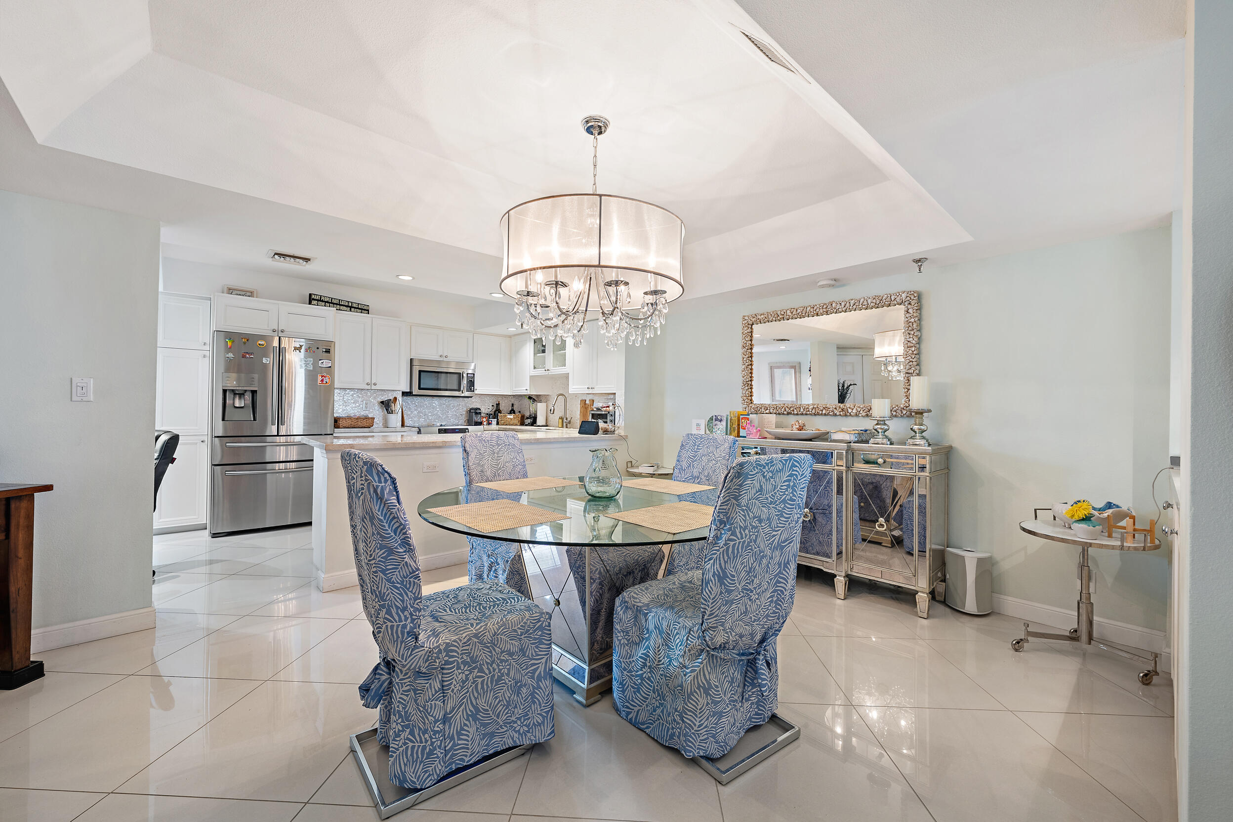 176 Helios Drive, Unit 603 Jupiter, FL 33477 - Photo 8 of 28 a view of a dining room with furniture