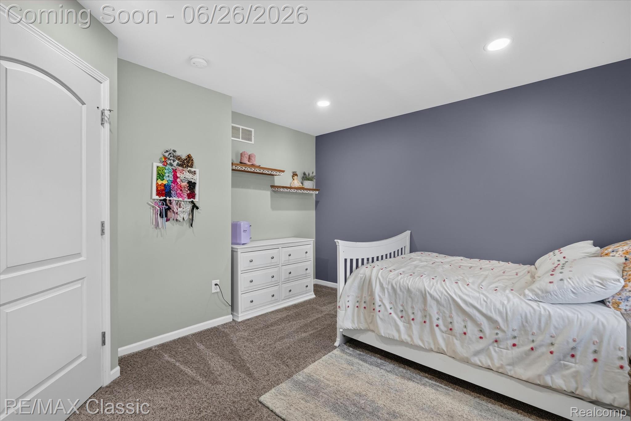 3205 North Milford Road Highland, MI 48357 - Photo 23 of 53 Recessed lighting illuminates walls featuring a contrasting accent color