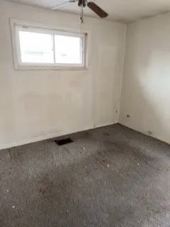 an empty room with a window