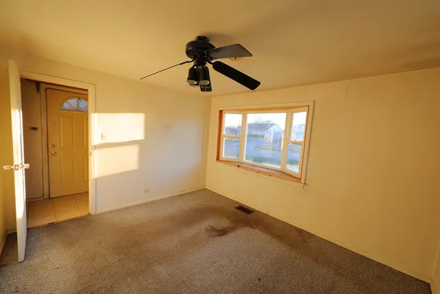 a view of a livingroom with a window
