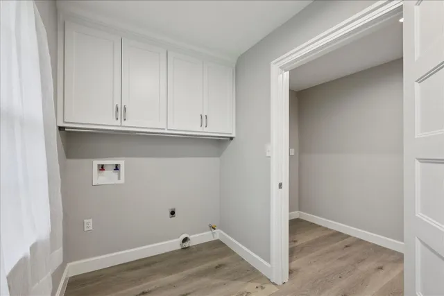 an empty room with cabinet