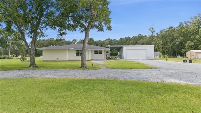 a view of outdoor space yard and garage