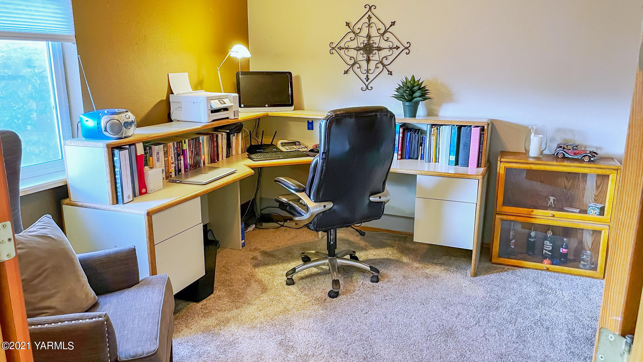 661 Wakatak Road Yakima, WA 98908 - Photo 13 of 20 a view of a workspace with furniture and a window