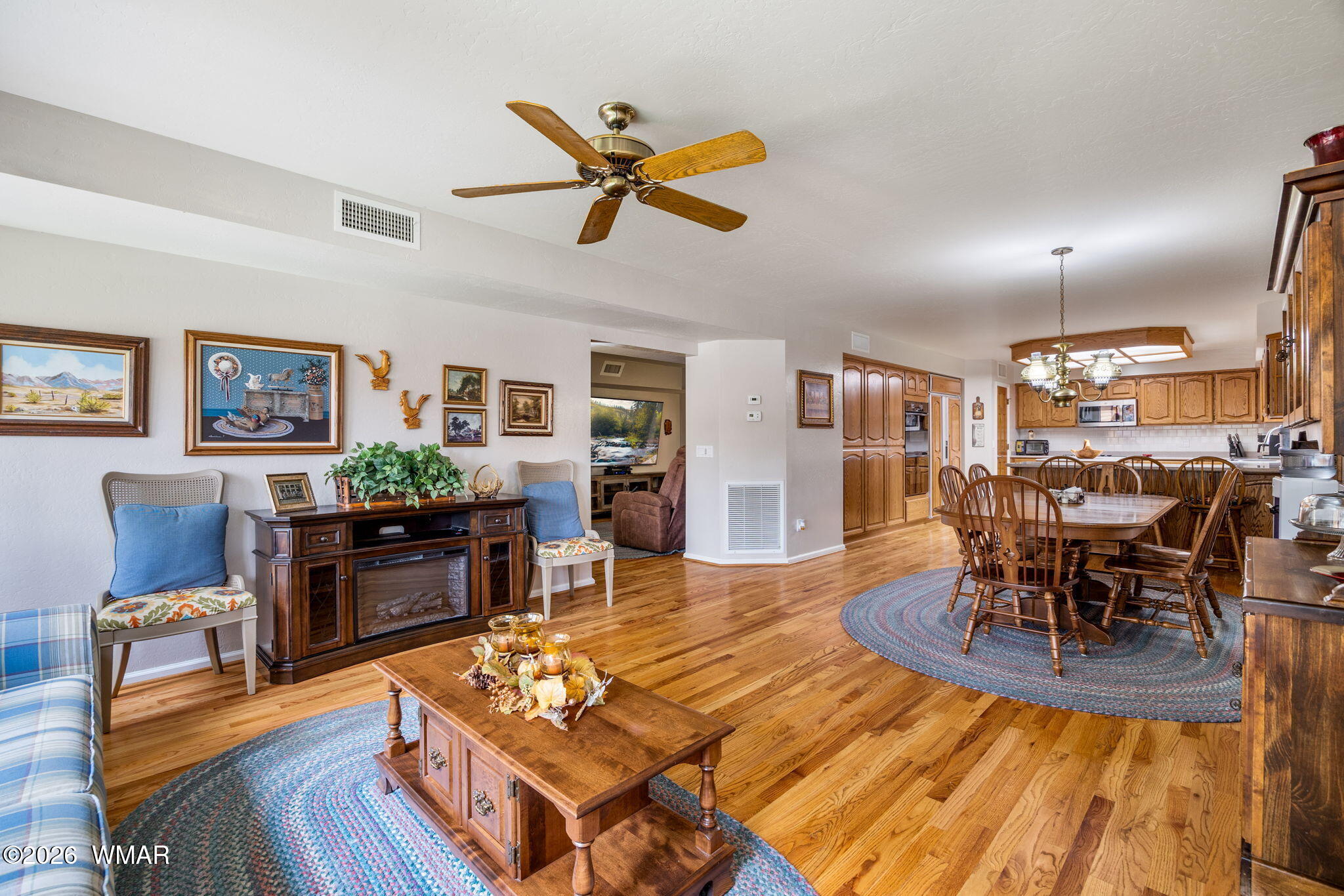 2922 Pine Rim Road Overgaard, AZ 85933 - Photo 14 of 58 a living room with furniture and wooden floor