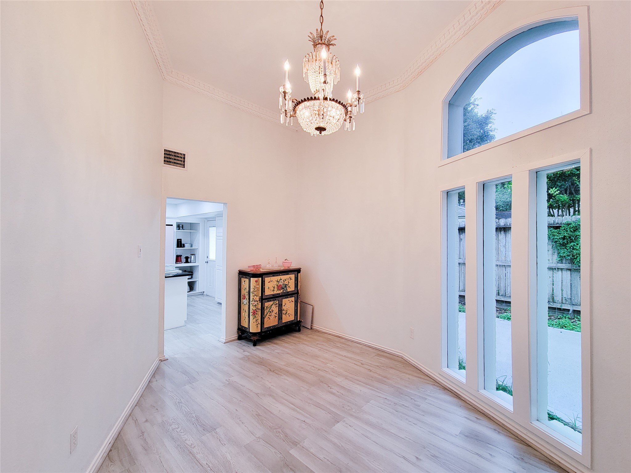 5654 Cheena Drive Houston, TX 77096 - Photo 16 of 50 a view of a room with wooden floor