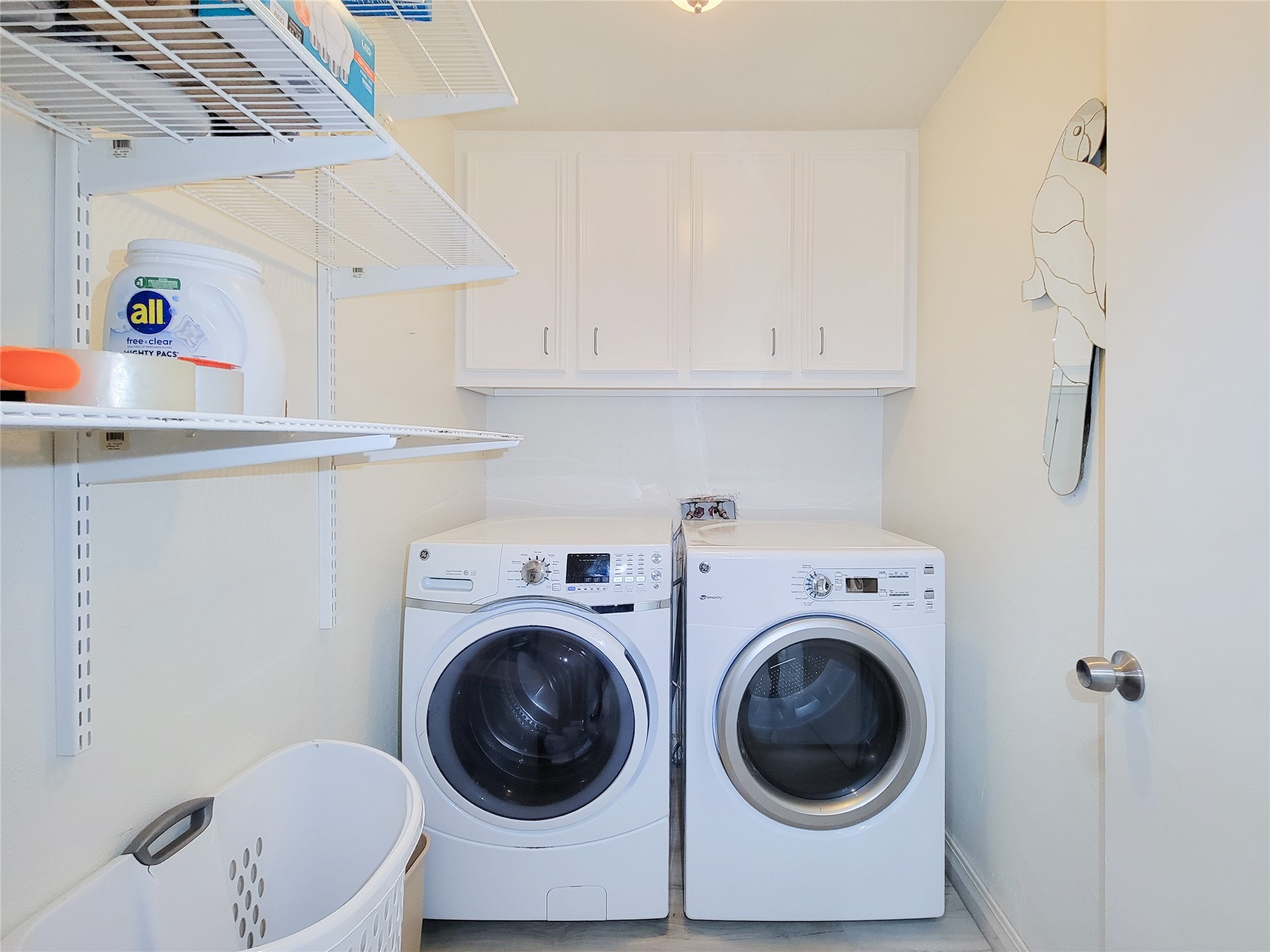 5654 Cheena Drive Houston, TX 77096 - Photo 20 of 50 a utility room with dryer and washer