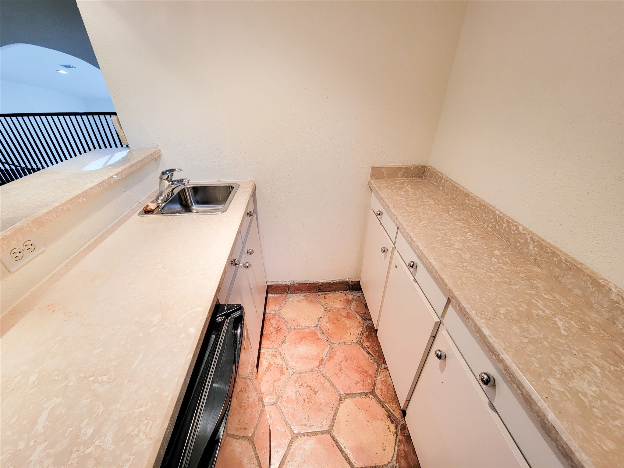 5654 Cheena Drive Houston, TX 77096 - Photo 31 of 50 a view of a hallway with washer and dryer