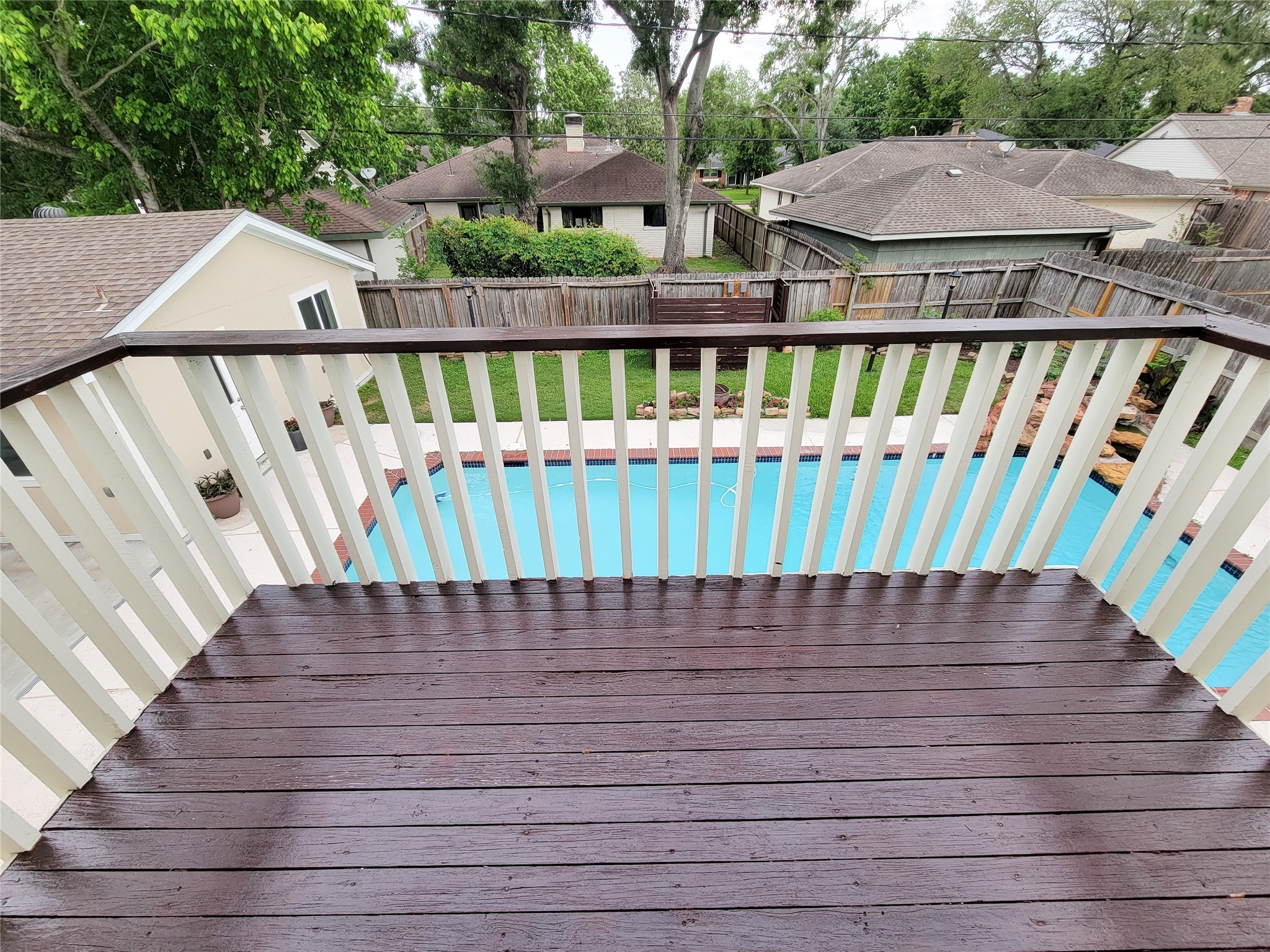 5654 Cheena Drive Houston, TX 77096 - Photo 35 of 50 a view of a wooden deck