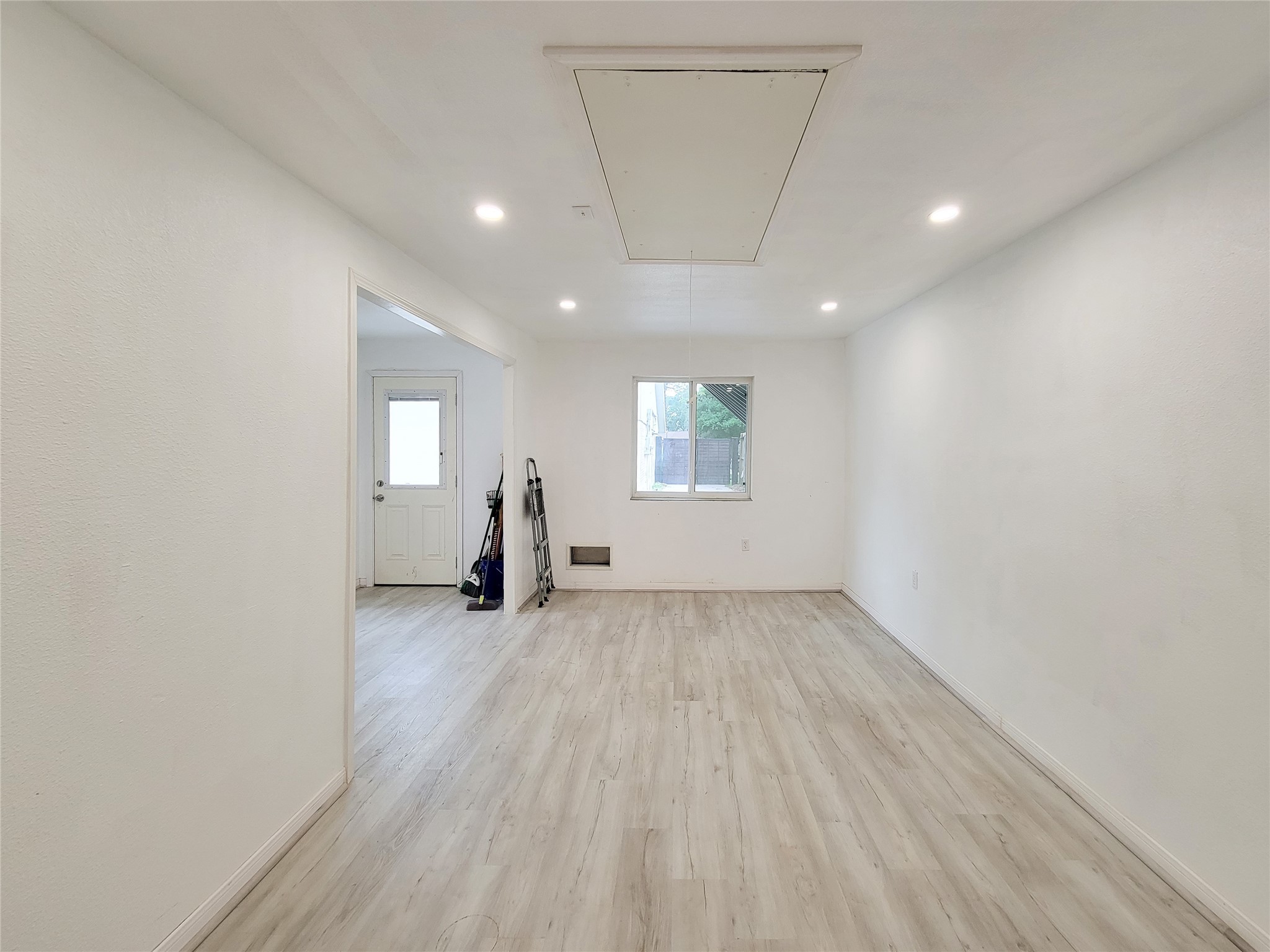 5654 Cheena Drive Houston, TX 77096 - Photo 41 of 50 a view of empty room with wooden floor and fan
