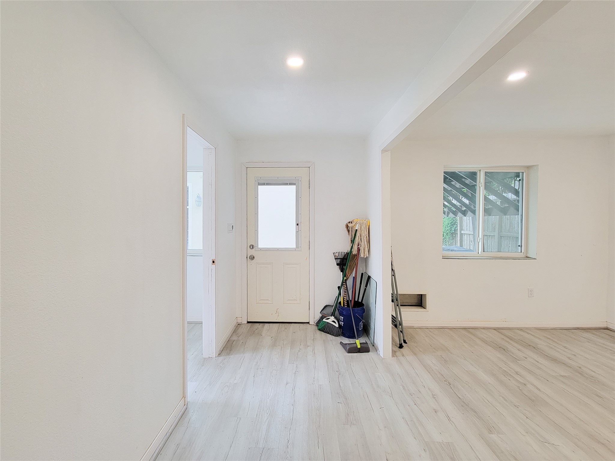 5654 Cheena Drive Houston, TX 77096 - Photo 43 of 50 an empty room with wooden floor and windows