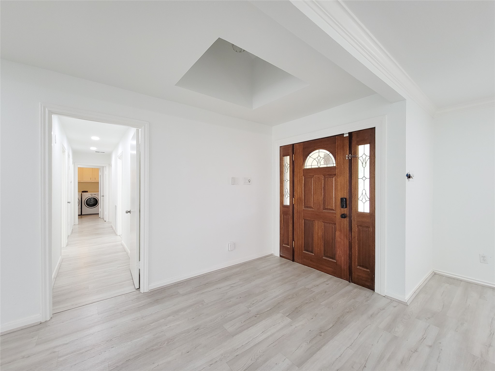 5654 Cheena Drive Houston, TX 77096 - Photo 7 of 50 a view of an empty room with wooden floor and closet
