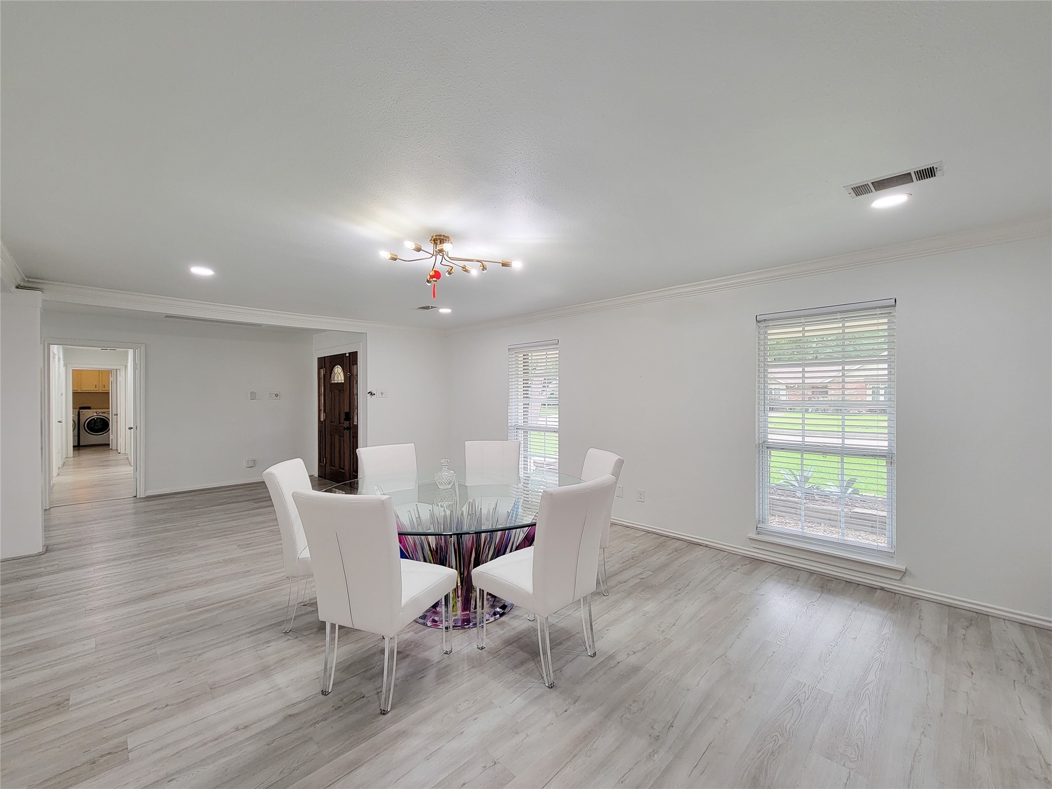 5654 Cheena Drive Houston, TX 77096 - Photo 8 of 50 a view of a dining room with furniture and wooden floor