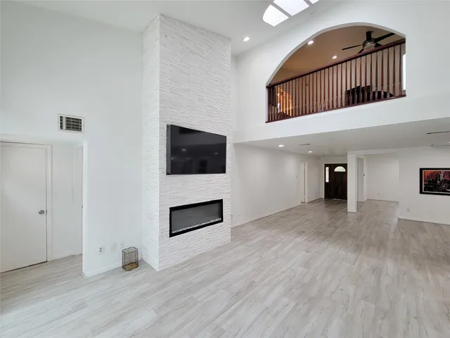 a view of a livingroom with wooden floor