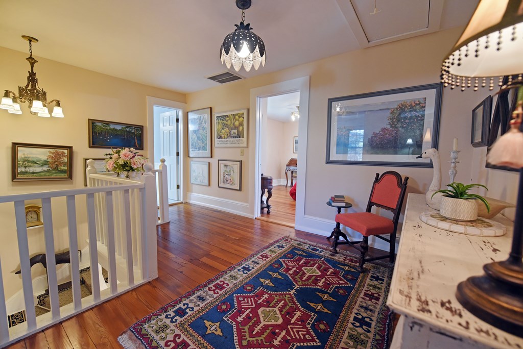 63 Loving Road Morganton, GA 30560 - Photo 46 of 58 a living room with furniture and a wooden floor